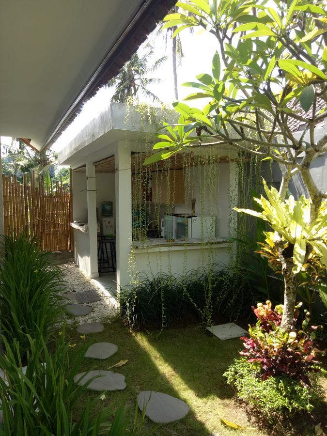 Andy Guesthouse Canggu Eksteriør billede