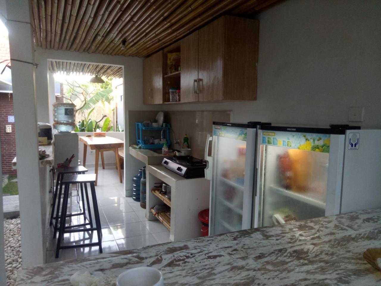 Andy Guesthouse Canggu Eksteriør billede